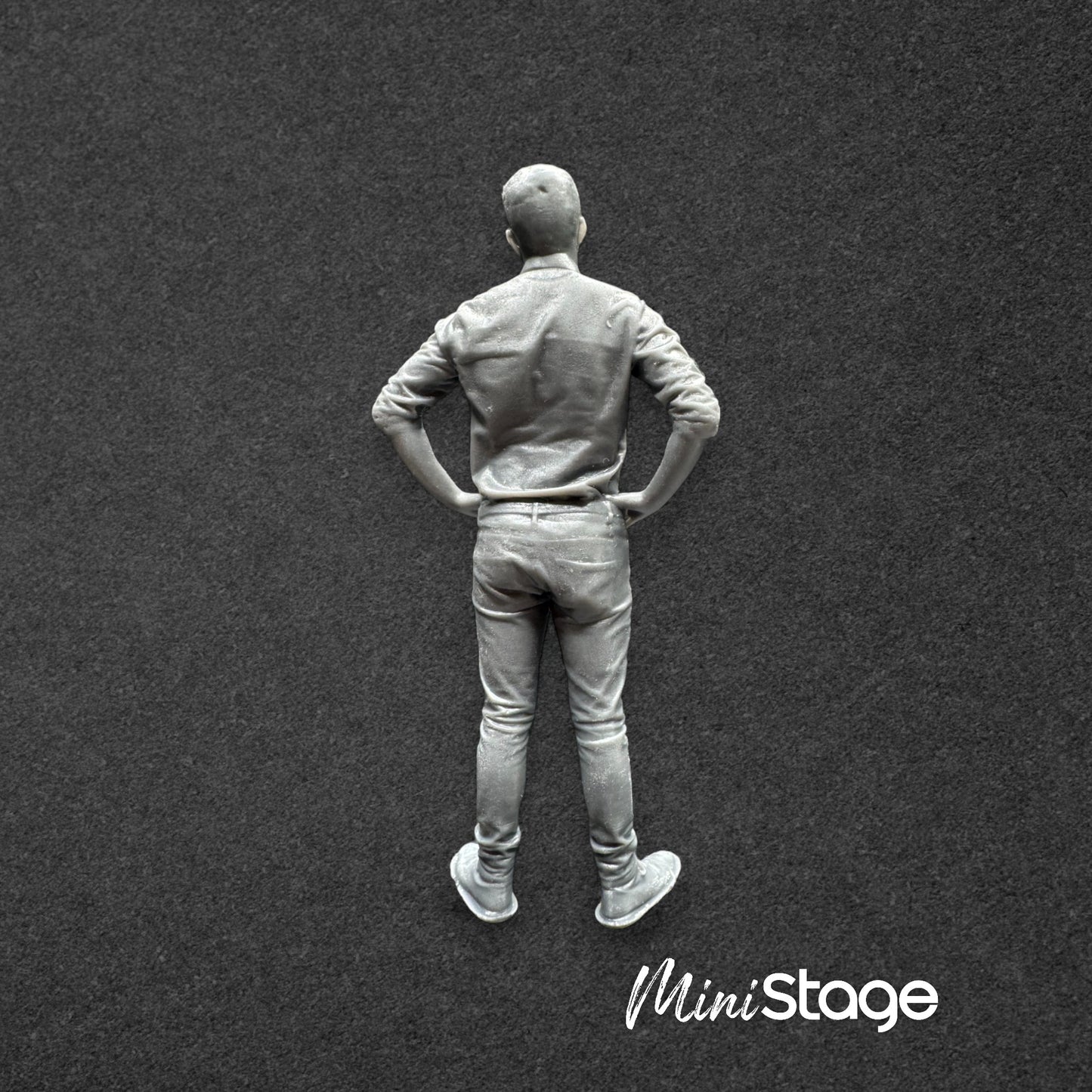 Jack - Figure of a male standing wearing a shirt and jeans with his hands on his hips