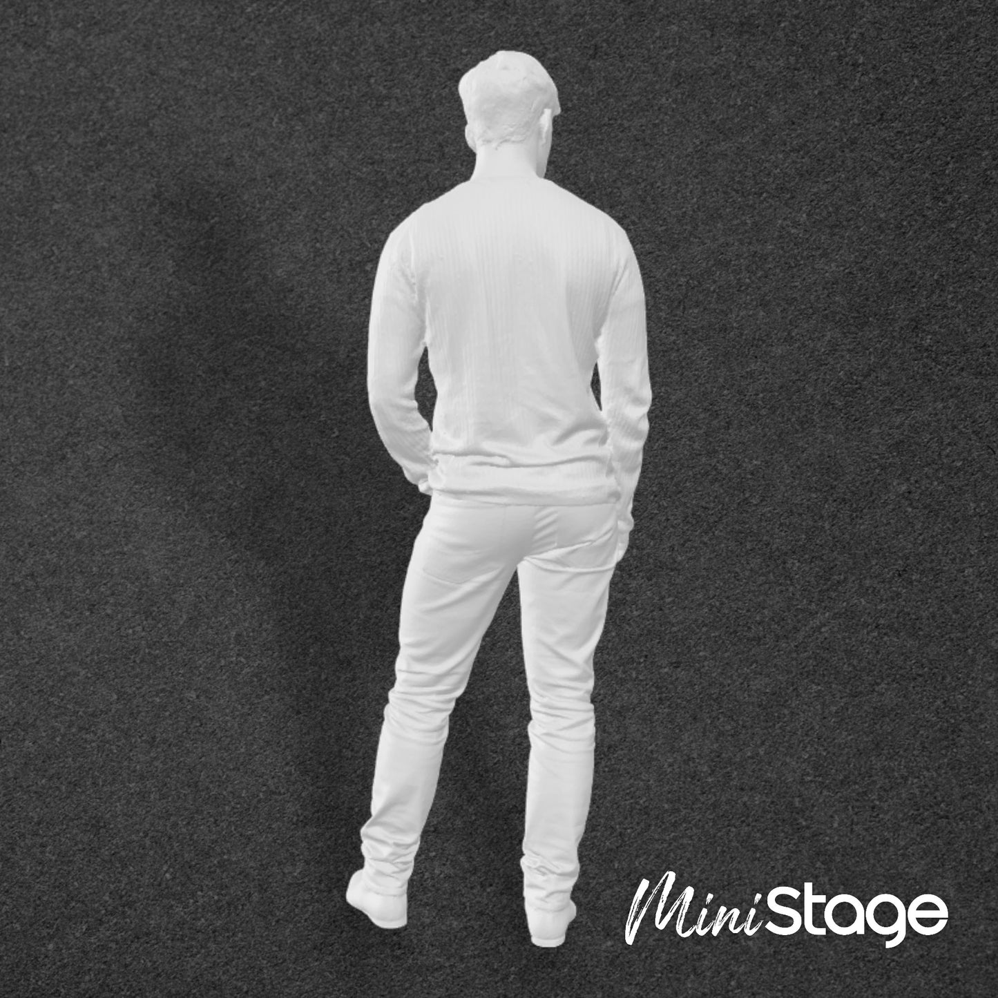 Noah - Figure of a male standing wearing jeans and a jumper, with his left hand in his pocket