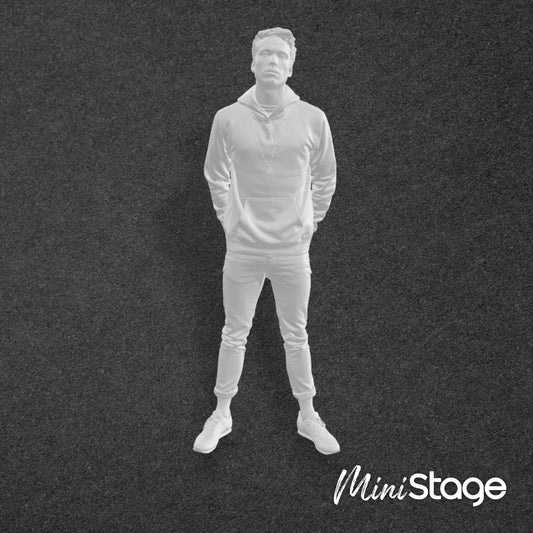 Figure of a Male Standing wearing rolled up jeans and a hoodie