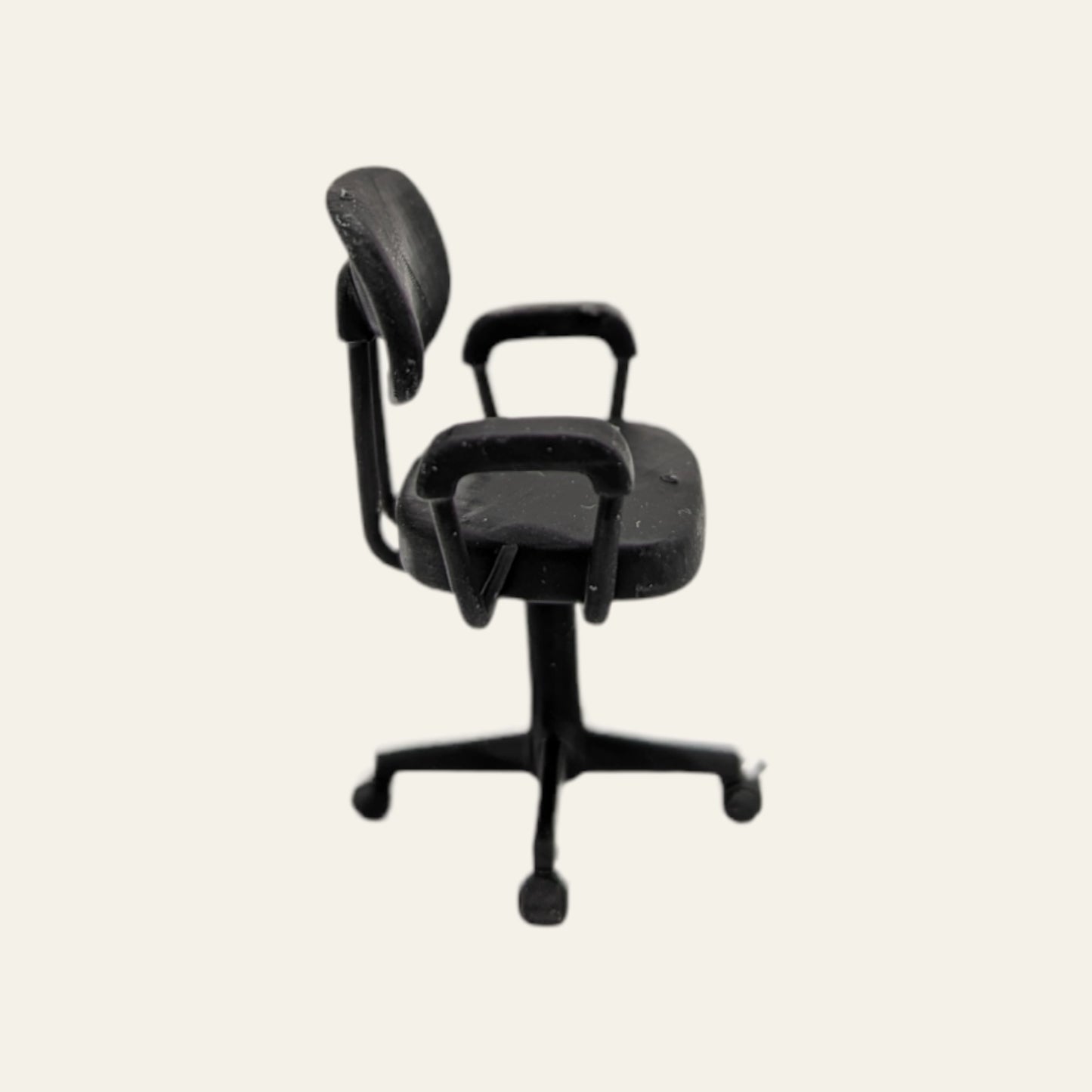Scale model of a small office swivel chair