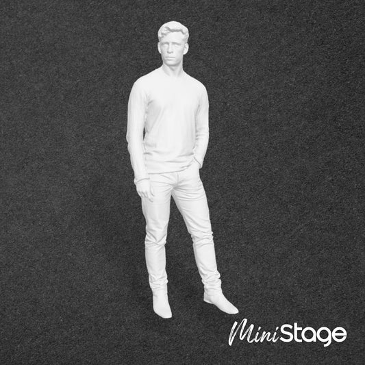 Figure of a male standing wearing jeans and a jumper, with his left hand in his pocket
